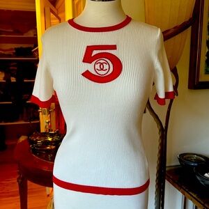 Chanel white knitted top. Pre-own in excellent condition.
